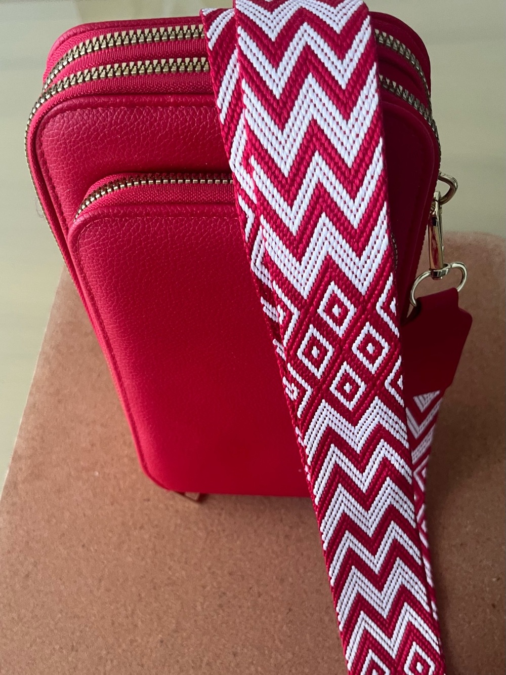 Bright Red Crossbody Bag with Patterned Strap